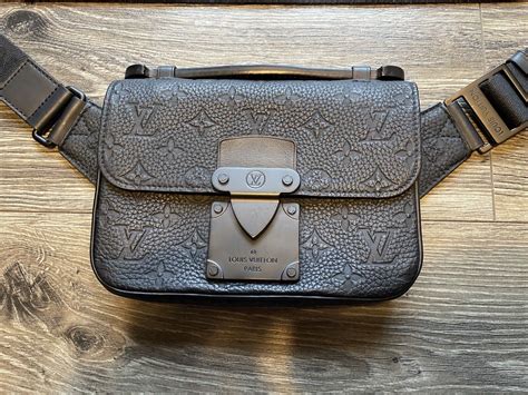 LOUIS VUITTON Monogram S Lock Sling Bag .